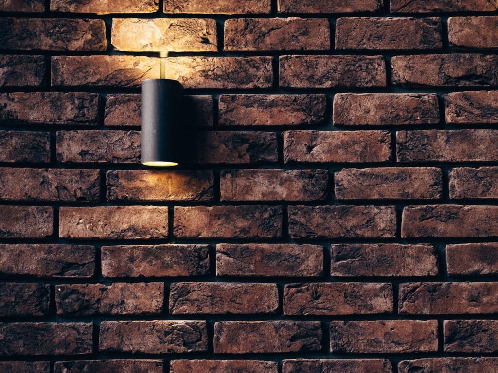brick wall with a lamp